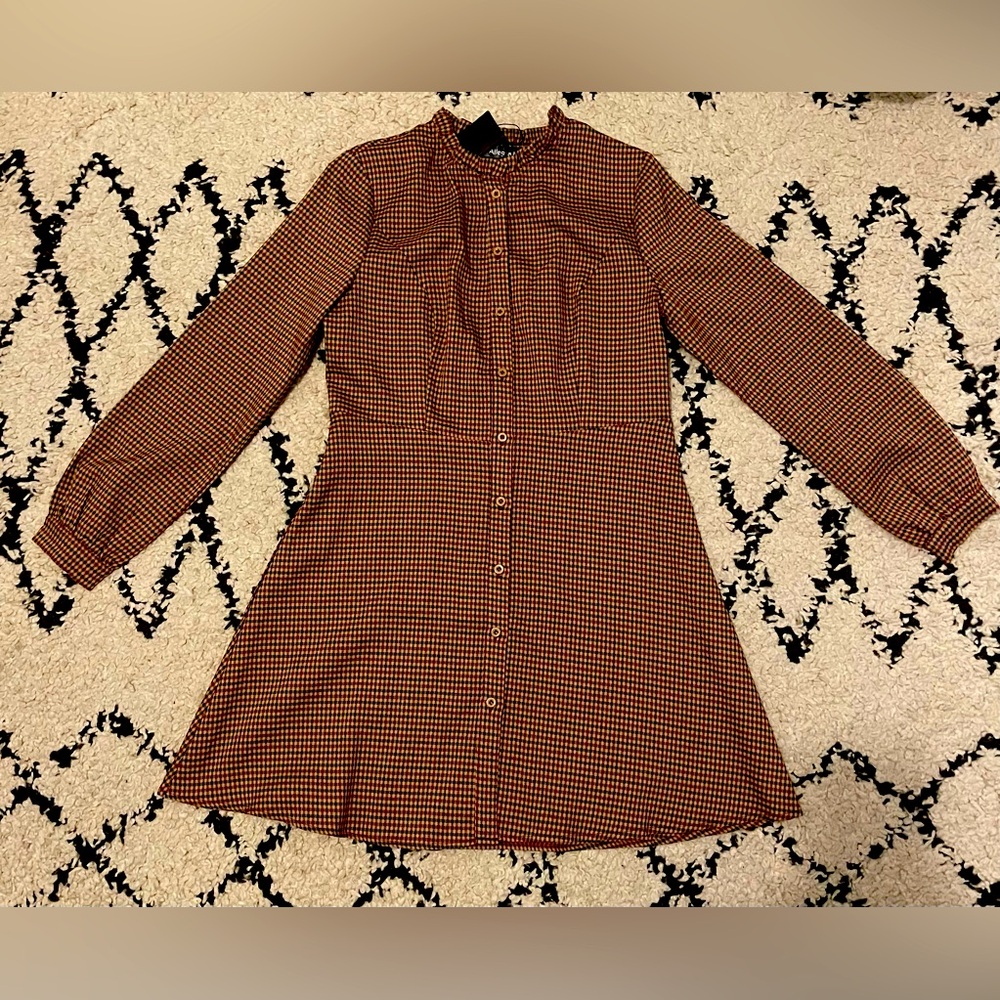 Allegra K long sleeve button up plaid dress in Medium. Material does not stretch
